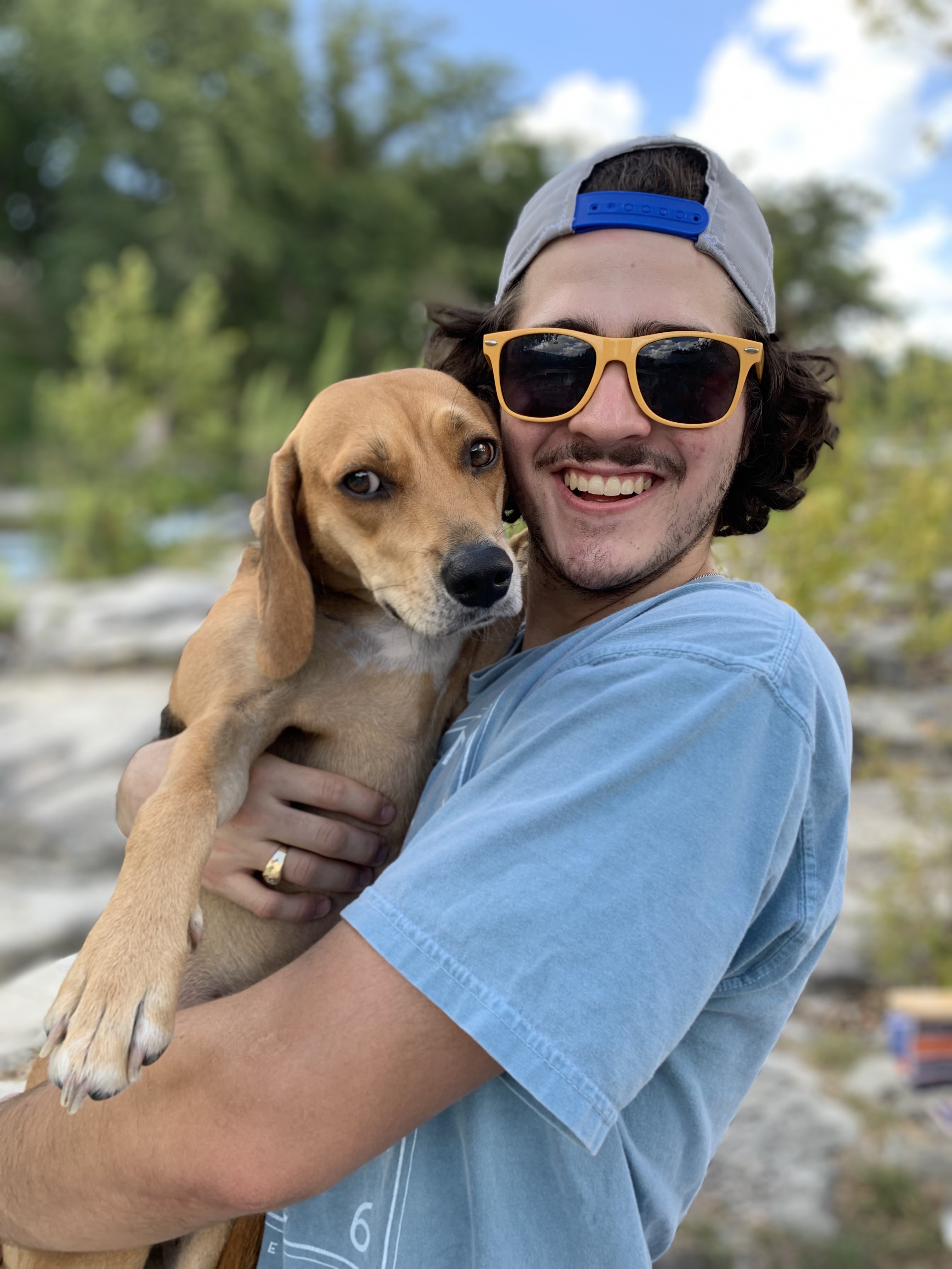 Man holding his dog